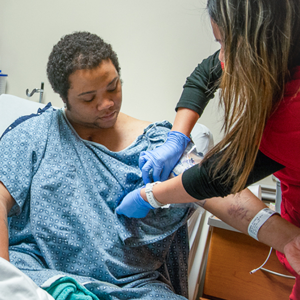 patient with nurse receiving treatment